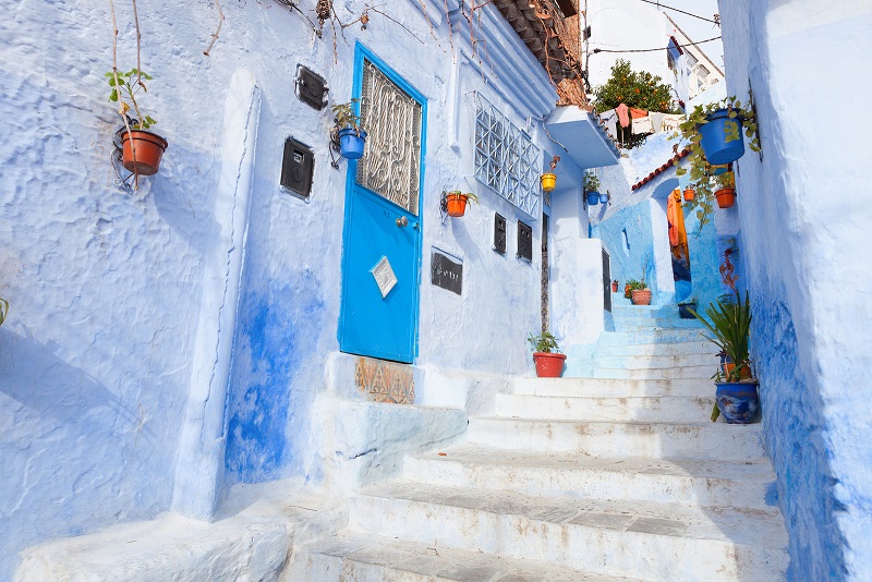 An alleyway in the medina, Chefchaouen, Morocco. Colourful cities in the world