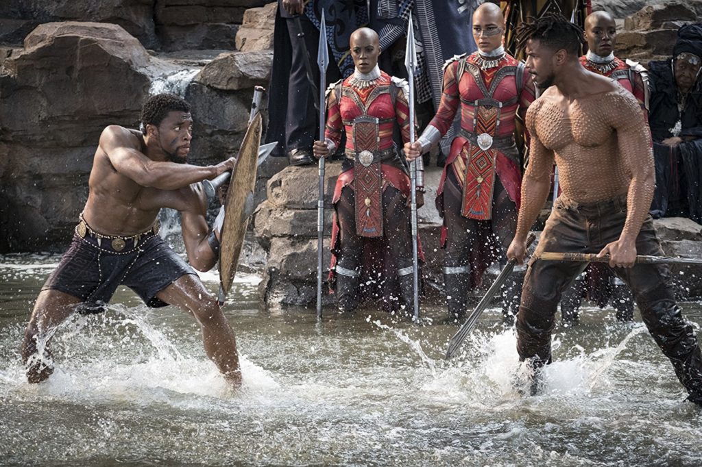 tchalla and kilmonga fight at the fountain