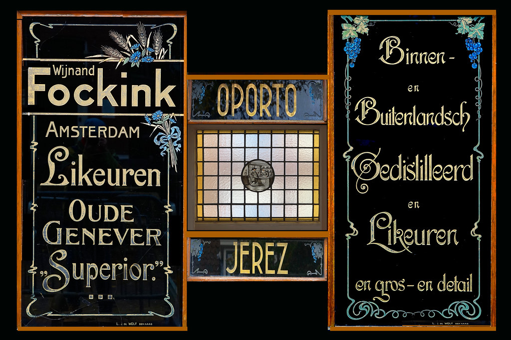 Historic decorative glass signage of the Wynand Fockink distillery and tasting room in central Amsterdam