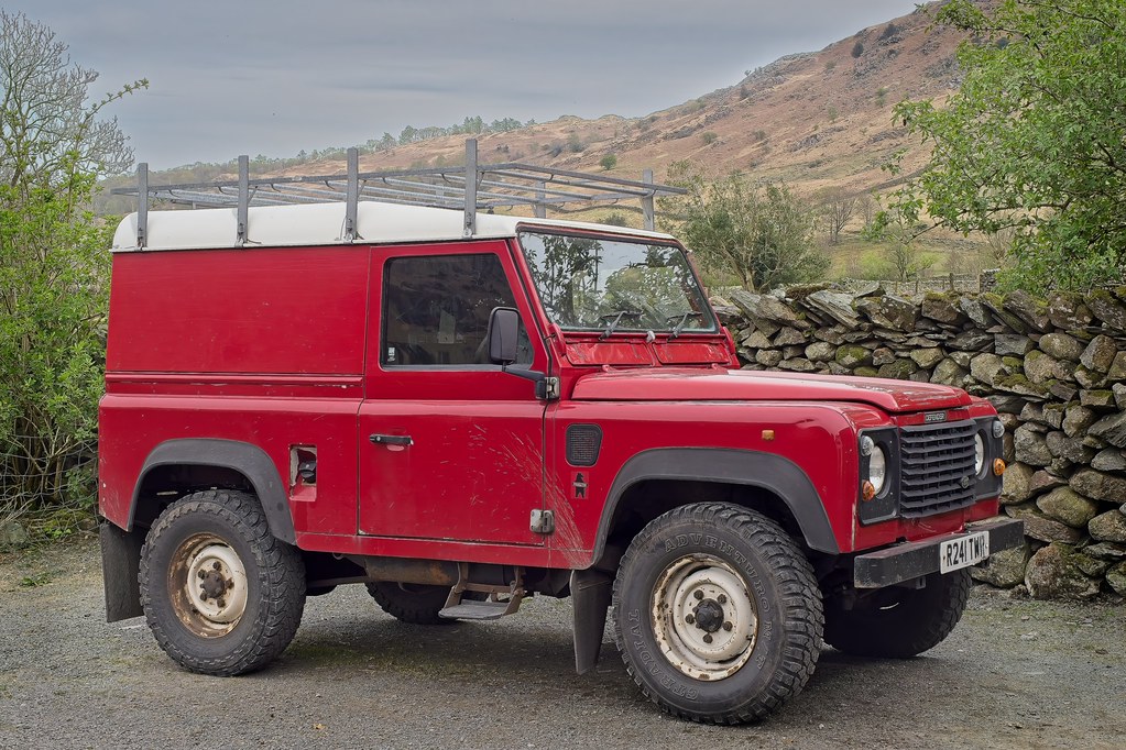 Open 4x4 safari game drive vehicle observing wildlife in Africa