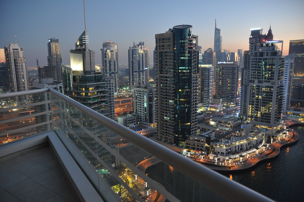 Panoramic scenic view of Dubai Marina Promenade at Sunset.
