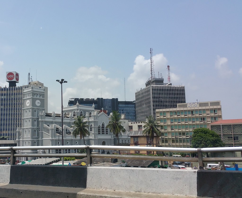 Panoramic view across the historic Marina waterfront and commercial urban skyline of Lagos Island (Eko), Nigeria.
